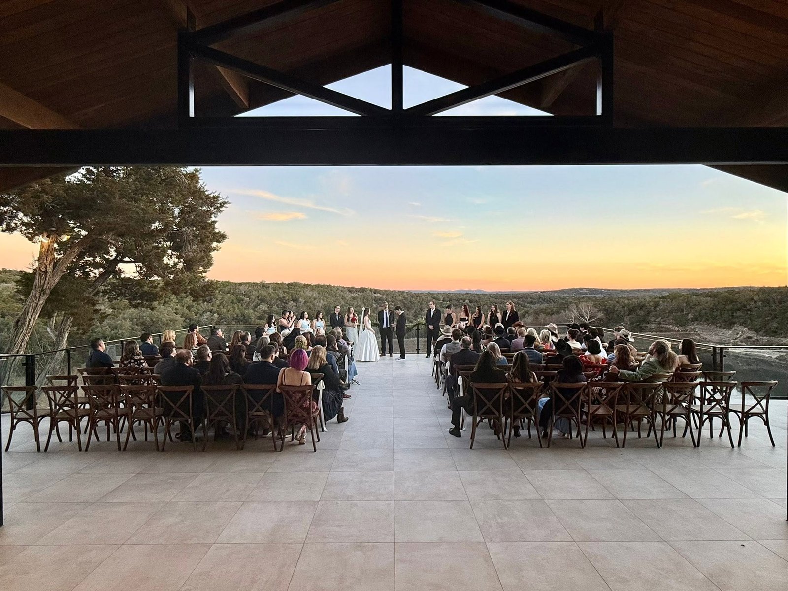 Outdoor wedding ceremony at sunset